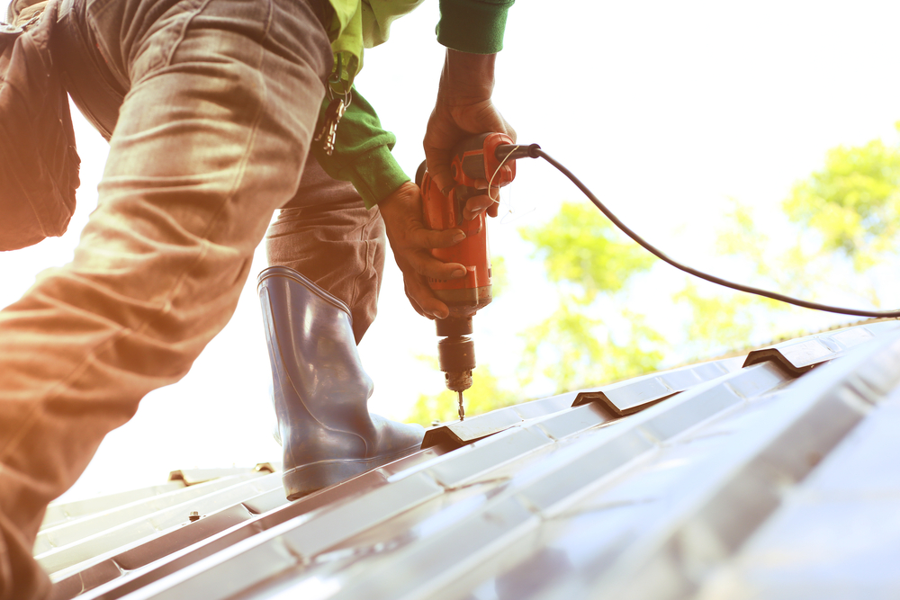 Metal roofing contractors installing a new metal roof for a home in Bucks County PA