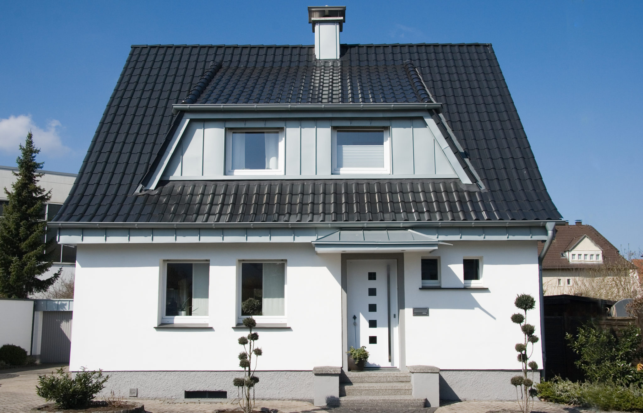 A residential home with metal roof.